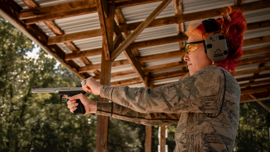 woman-cocking-gun CAHSS National Plan woman cocking gun