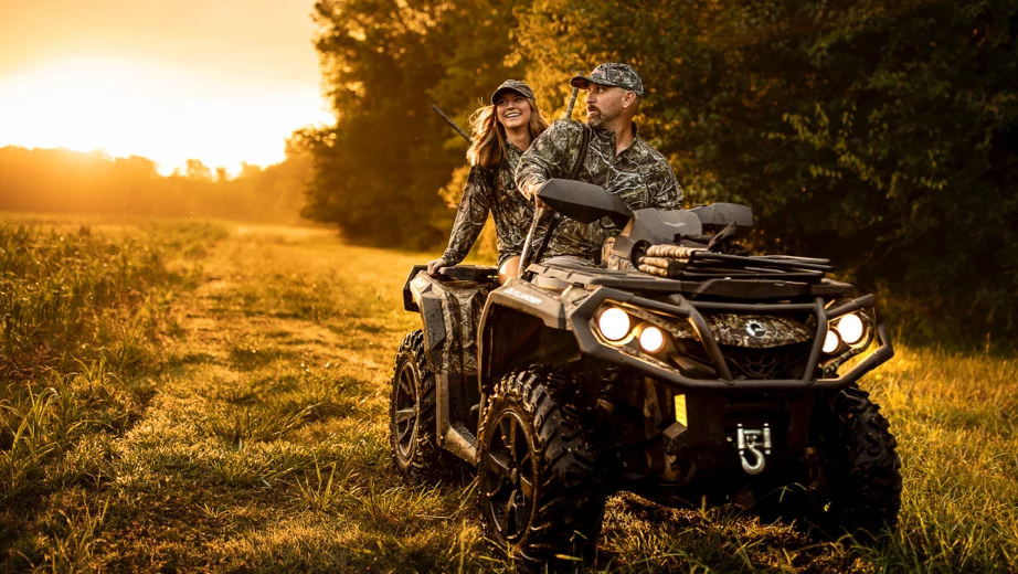 enjoying-outside-on-atv man and woman outside on ATV enjoying nature